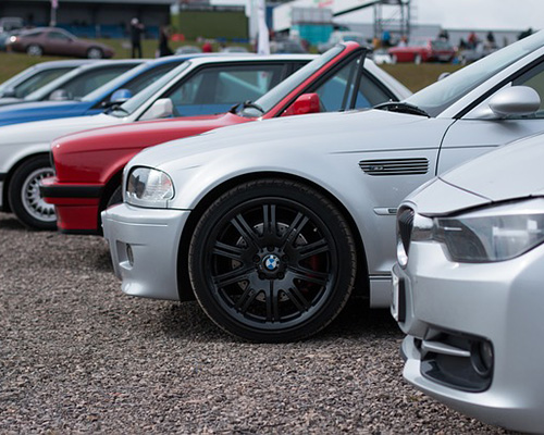 E46 BMW parked near other BMWs